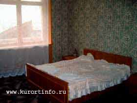 Спальная комната в номере люкс, Приэльбрусье, отдых в горах